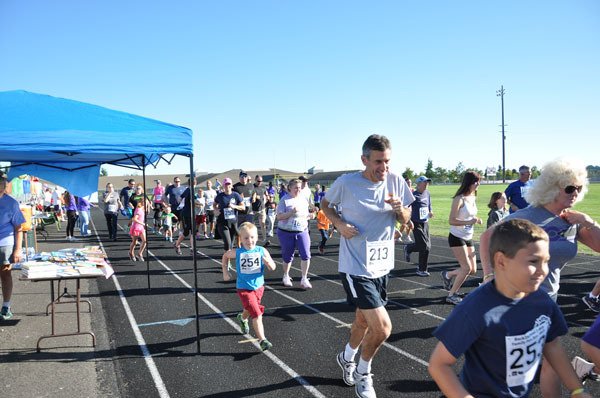 Participants kick-off the Back-2-School Family Fun Run at last year’s event. This year’s event runs Sept. 12
