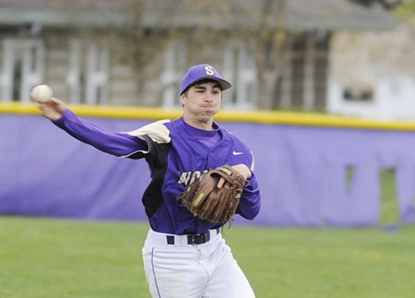 Sequim shortstop Dylan Lott whips a throw across the diamond for an out as the Wolves take on Fife on April 17.
