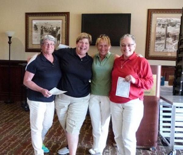 The winning team at the Memorial Tournament raising funds for Volunteer Hospice of Clallam County includes