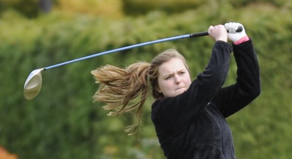 Sequim’s Kailee Price watches a drive on the first hole on April 23.