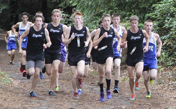 Sequim High School's varsity boys race to a fine finish as they sweep Olympic and North Kitsap on Sept. 24 in Bremerton.
