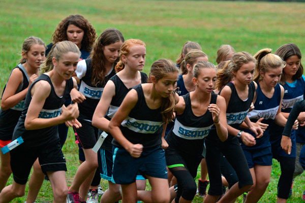 Sequim Middle School's girls cross country break from the starting line at a league meet at Robin Hill County Park on Oct. 7. Sequim's girls edged Stevens (Port Angeles) for the first time this season by a mere three team points.