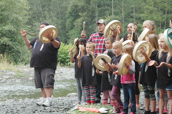 Participants of Jamestown S’Klallam Tribe’s Children’s Program sang the S’Klallam Welcome Song during the tribe’s Salmon Homecoming Ceremony intended to honor and show respect toward the salmon and their journey back to the area.