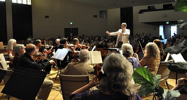 Adam Stern conducts a recent performance of the Port Angeles Symphony