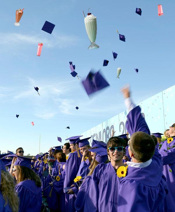 Sequim High School seniors celebrate at their 2012 graduation. Milkshakes likely were not involved in the celebration.