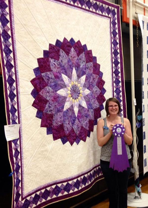 Sequim quilter Brianne Reed’s “Color Me Purple” quilt won “Best of Show” at the Sunbonnet Sue Quilt Club’s annual Quilt Show on July 17-19.