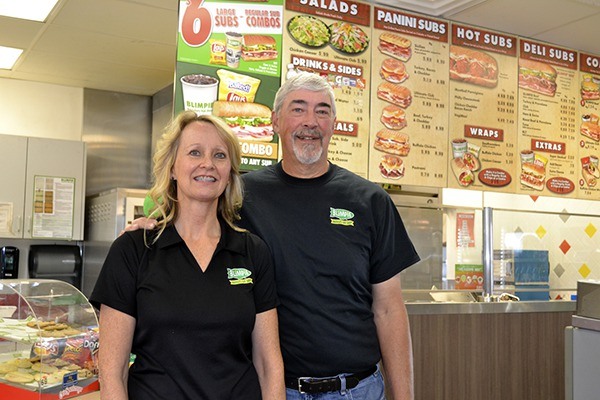 Jim and Julie Schumacher stand inside the Carlsborg Station where they opened the new Blimpie on July 31. They plan for a grand opening on Nov. 14.