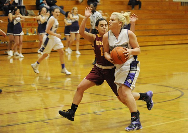 Sequim's Hailey lester drives to the basket as Sequim takes on Kingston on Dec. 17.