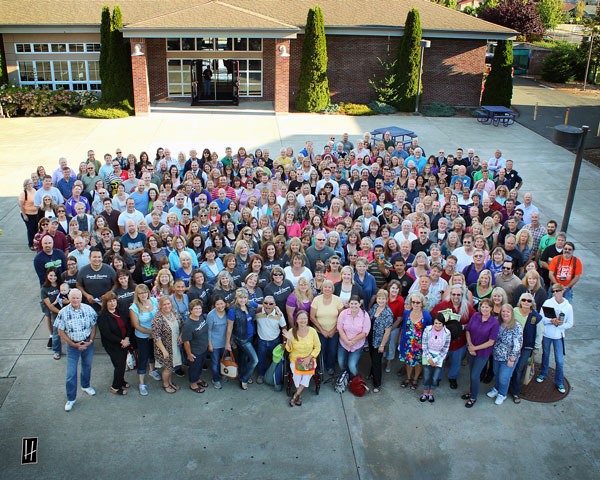 Staffers for the Sequim School District gather for a photo in late August. Classes for Sequim students at Helen Haller Elementary and Greywolf Elementary schools