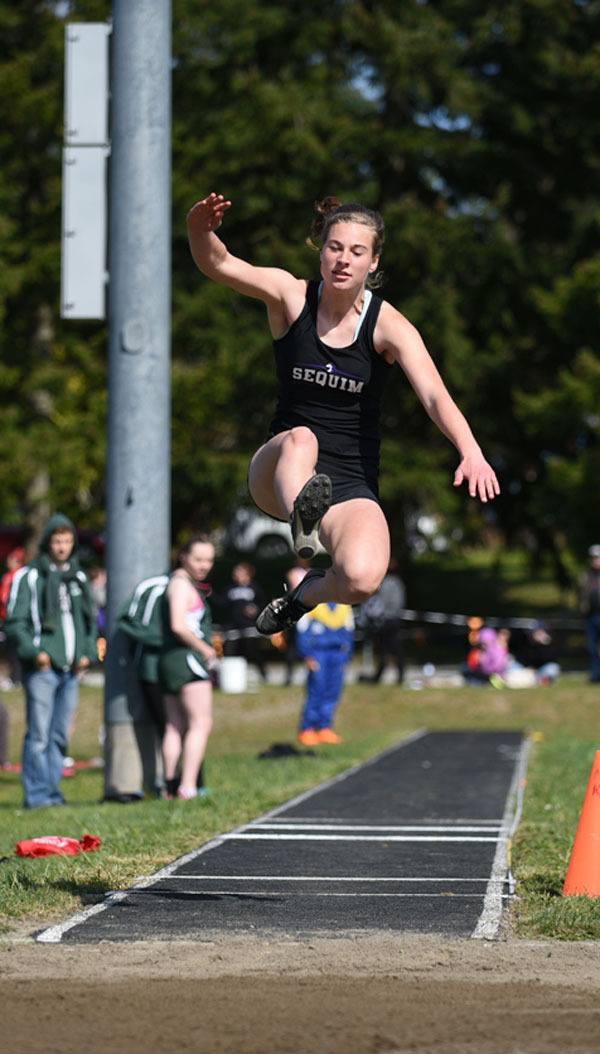Sequim’s Heidi Vereide takes second place in the long jump at the Lil’ Norway Invitational in Poulsbo on April 4.