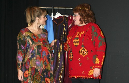 Sisters Frankie and Honey Raye (Brenda Dunlap and Barbara Frederick) consult on costuming for their Vegas-style Christmas pageant in “Christmas Belles.”