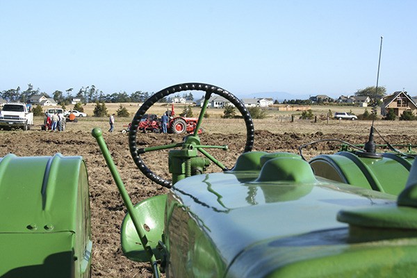 This interesting vantage point frames one of the tractors at last year’s Plow Day.