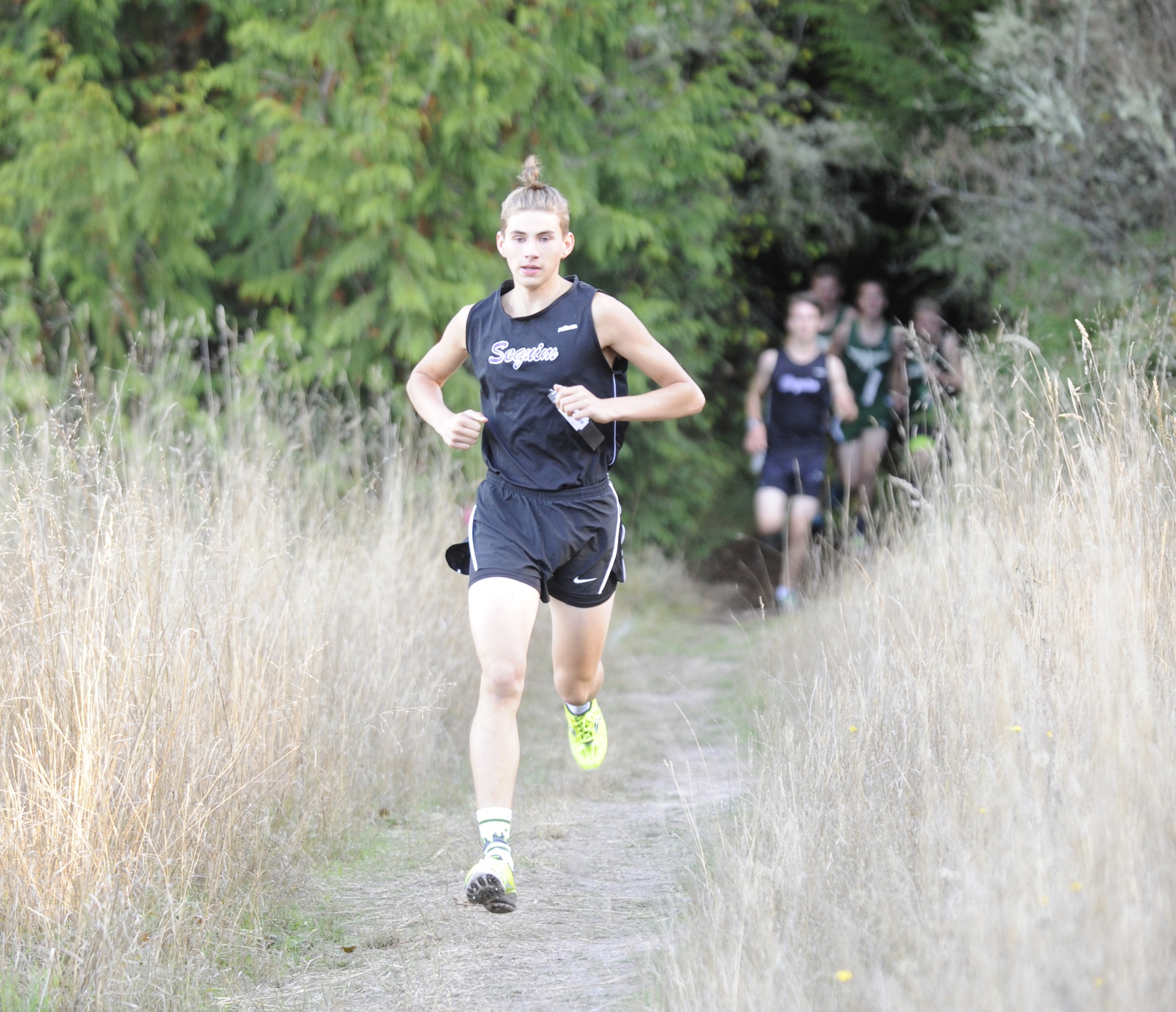 Alec Shingelton races to a third-place finish as Sequim takes second behnd Port Angeles at an Oct. 5 Olympic League meet at Robin Hill County Park. Sequim Gazette photo by Michael Dashiell
