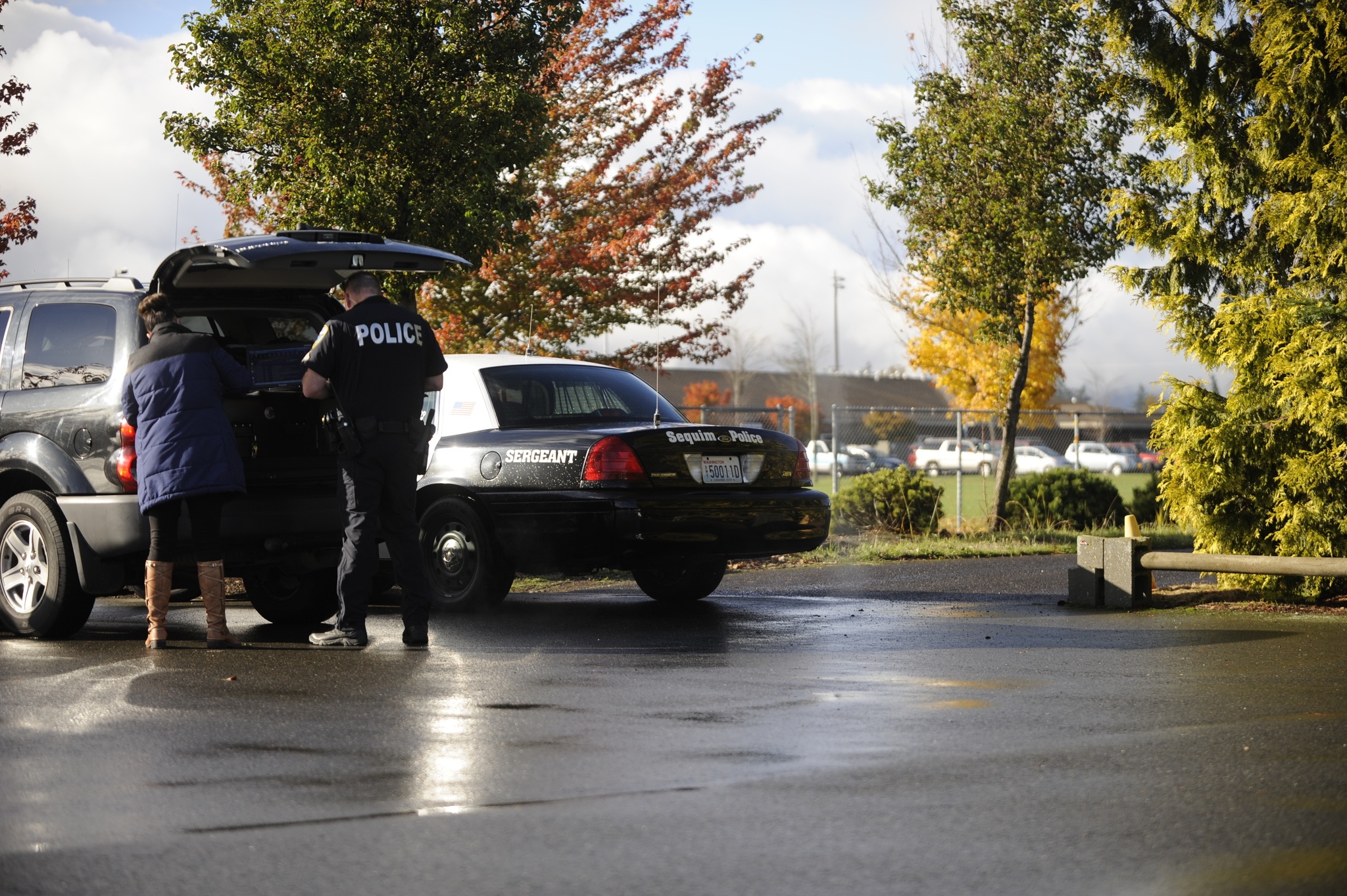 Sequim Police officials discuss details of a threat to Sequim Middle School on Oct. 20. Sequim Gazette photo by Michael Dashiell