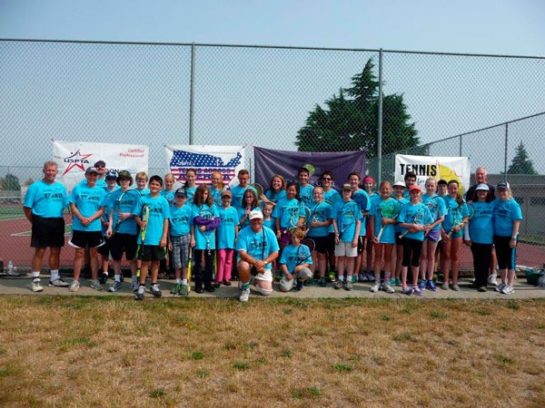 Attendees of the Sequim Tennis Academy gather for a group photo.