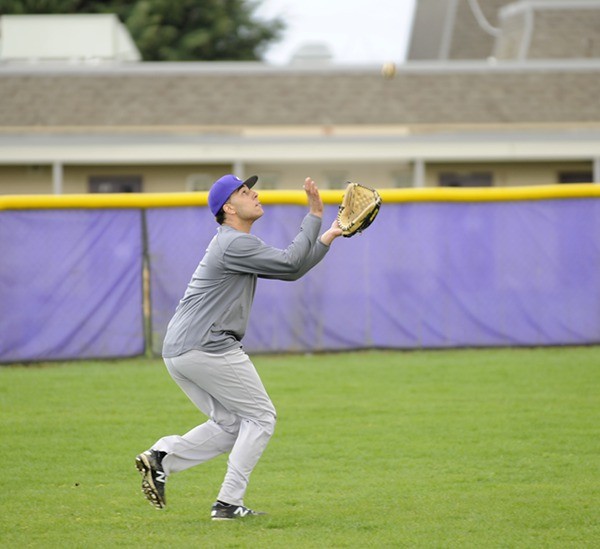 Nigel Christian makes a catch during a recent practice for the Wolves' baseball team. He'll start the season as Sequim's No. 1 pitcher after posting a 2-2 record and 3.23 ERA last year.