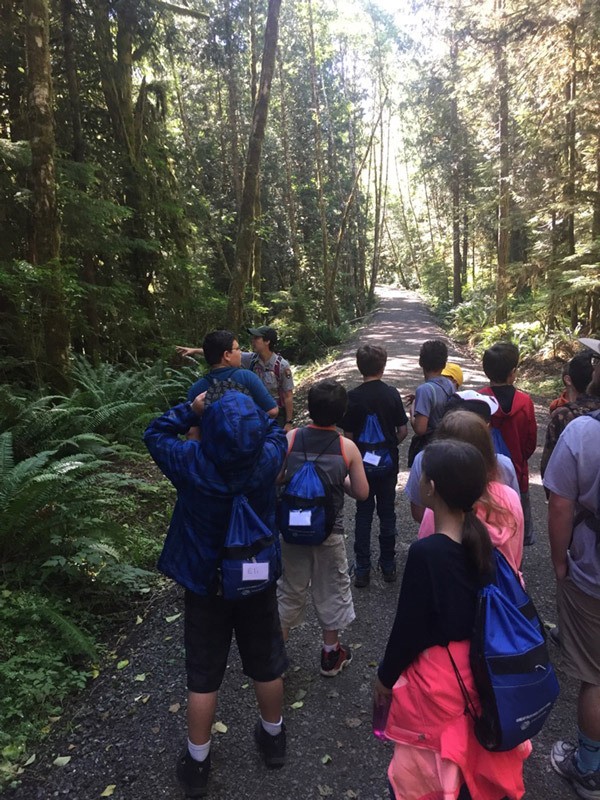 Junior Rangers explore the Spruce Rail Trail.