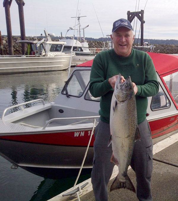 Jerry Thomas of Mount Vernon shows off his winning fish from the 2015 Olympic Peninsula Salmon Derby.