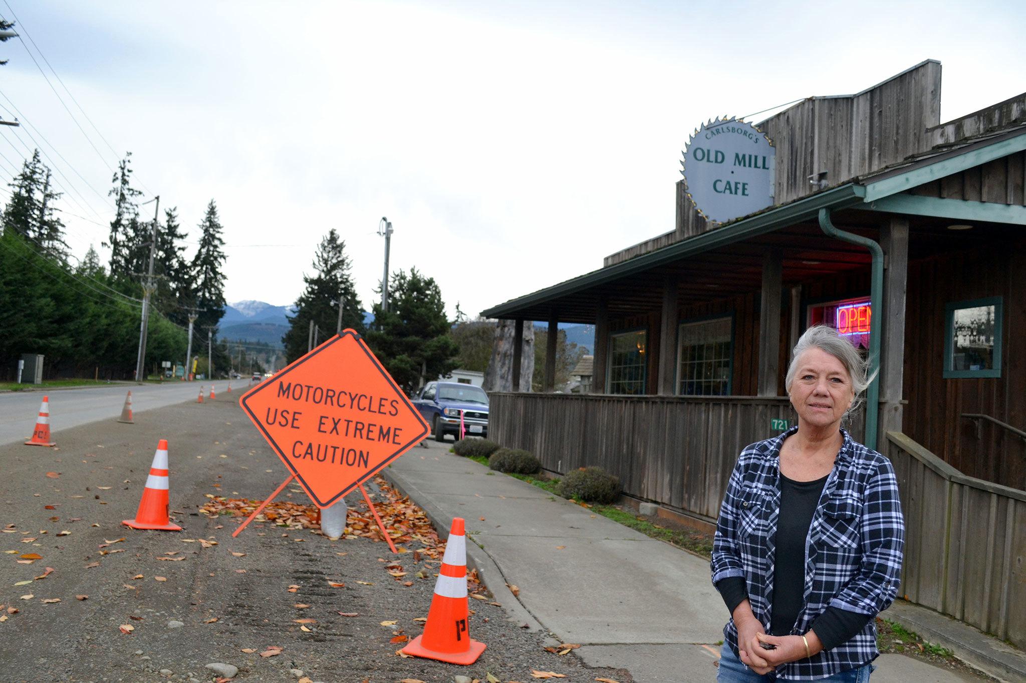 Val Culp stands outside her Old Mill Cafe on Carlsborg Road where she says construction for the Carlsborg Sewer Project is deterring customers and leading her to lose thousands of dollars a week in sales. Sequim Gazette photo by Matthew Nash
