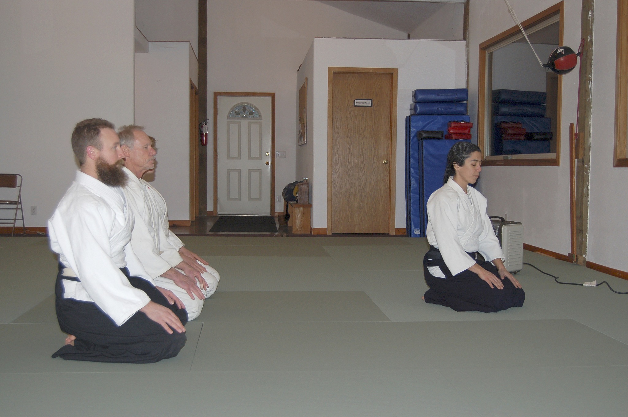 Chief Aikido instructor Neilu Naini leads her students, from left, James Burtle, Andy Brastad and William Jevne during a warm-up exercise at the Aikido Dojo off Carlsborg Road in Sequim. Sequim Gazette photos by Erin Hawkins