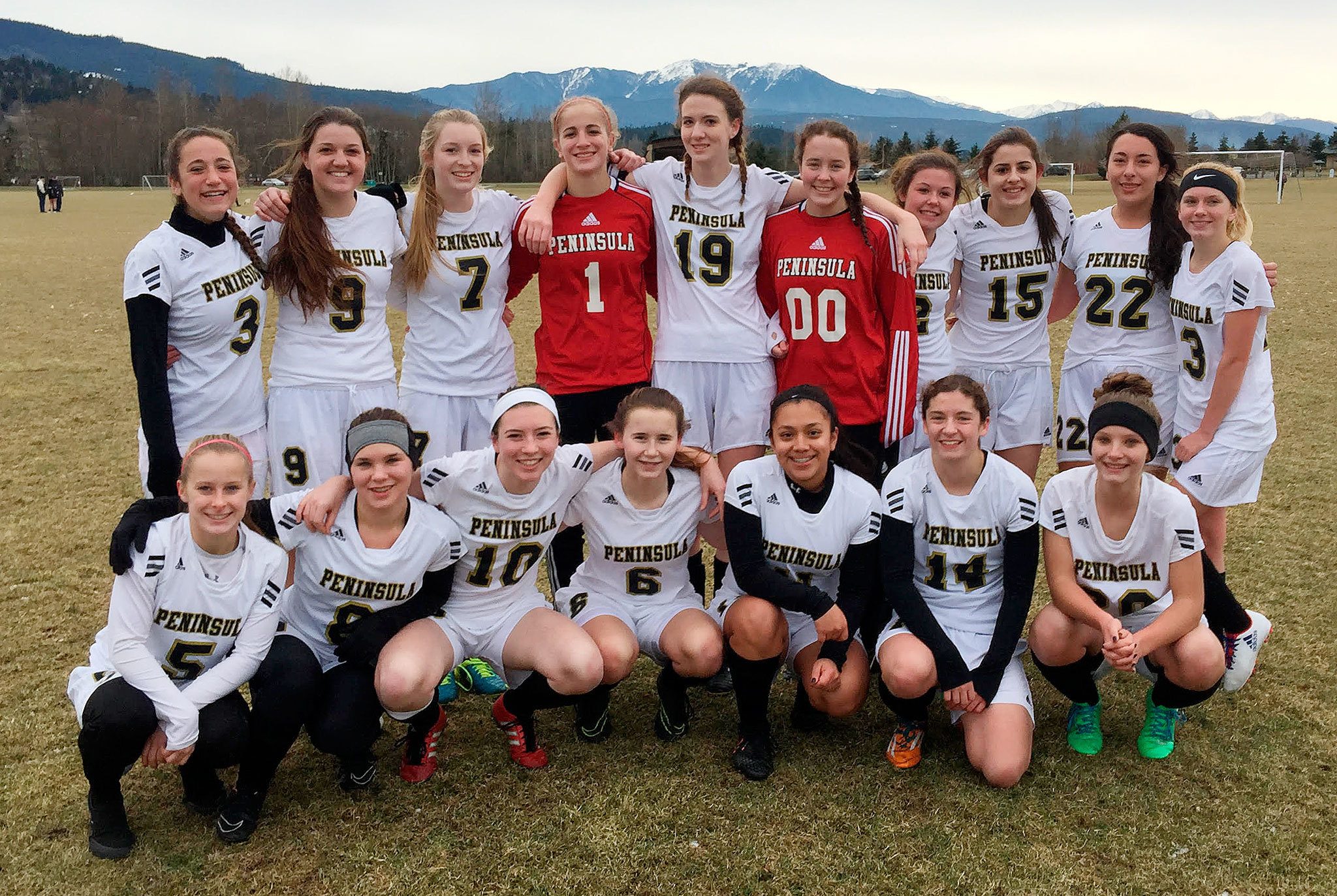 The Peninsula Soccer Academy includes, from back left, Yana Hoesel, Erin Vig, Kennedy Mason, Claire Henninger, Shanzi Cosgrove, Bonnie Sires, Nicole Heaton, Lola DelGuzzi-Flores, Oliver Barrett and Alivia Carvell, with from front left, Sierra Robinson, Annika Carlson, Leah Haworth, Delaney Wenzl, Nathalie Torres, Claire Payne and Peyton Heft. Submitted photo