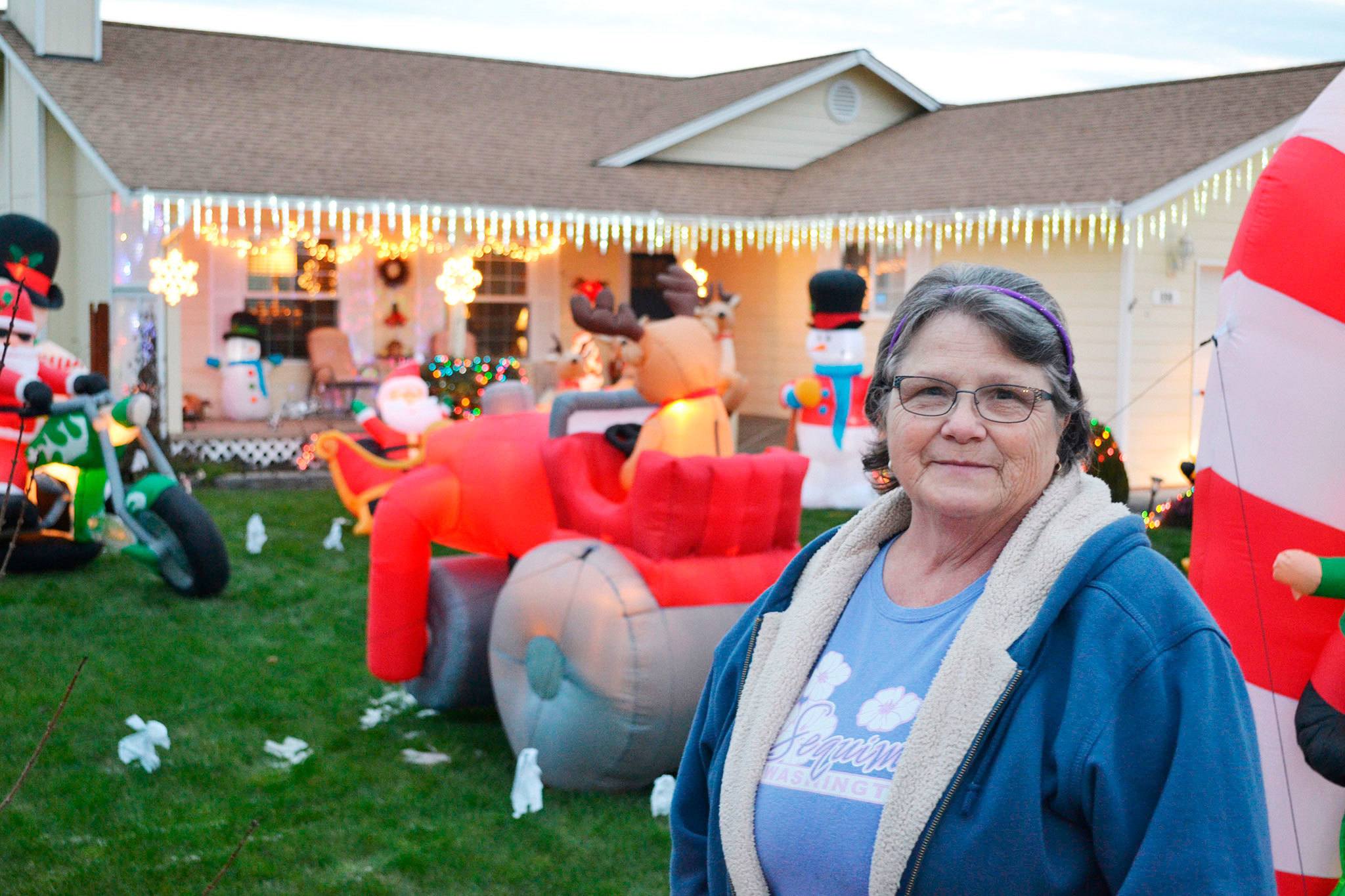 On New Year’s night, Mary Fisher and her husband Mel discovered their Santa on a motorcycle, seen to the left, was stolen from their yard. The couple’s yard is a bright spot each Christmas in Sequim and they hope whomever stole it returns it. Sequim Gazette file photo by Matthew Nash