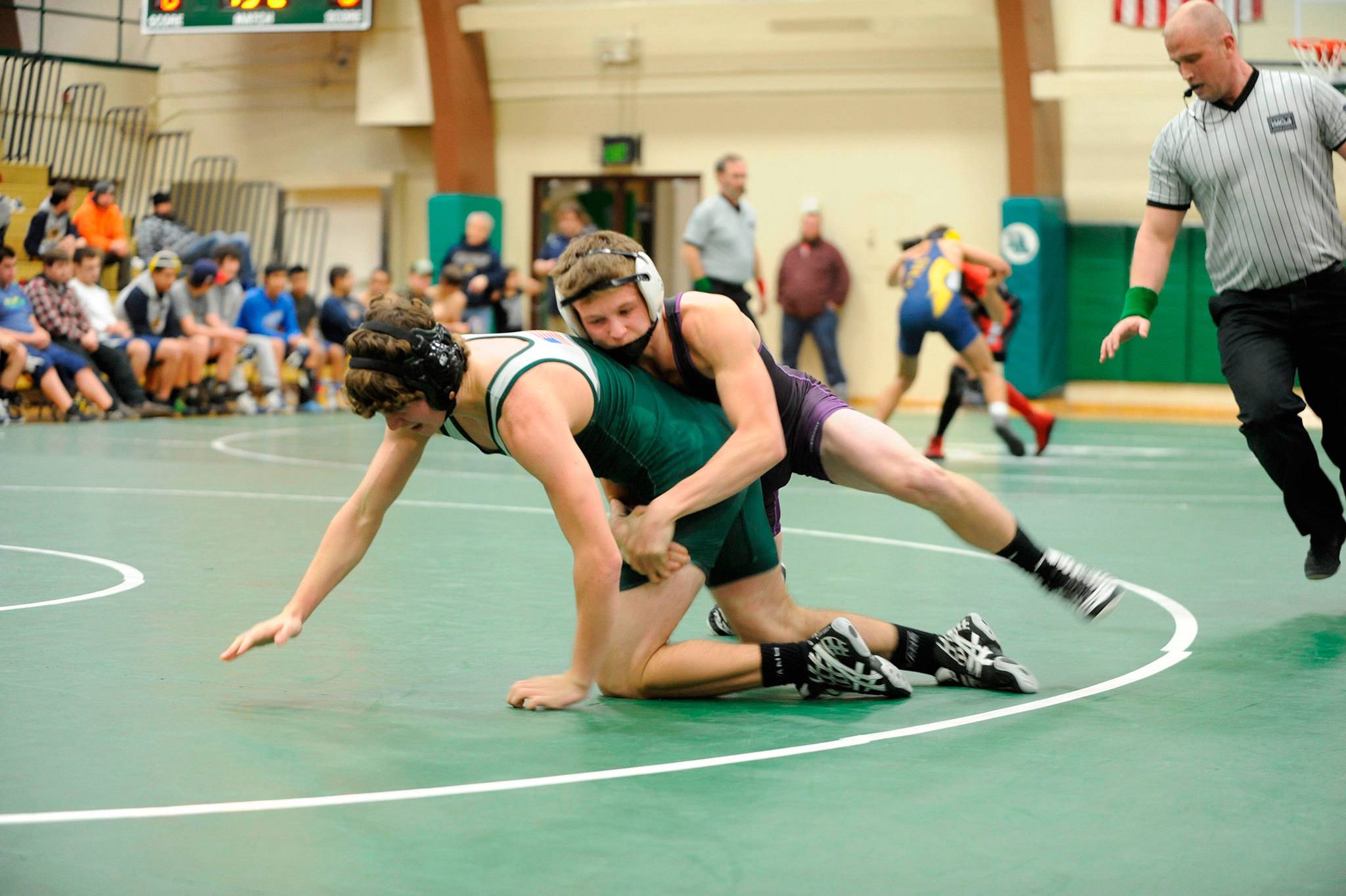Sequim’s Ben Newell, wrestling at 138 pounds on Jan. 12, against Port Angeles’ Slater Bradley, won his match on Jan. 19, in a dual meet with Kingston. The Wolves won 60-18. Sequim Gazette file photo by Matthew Nash