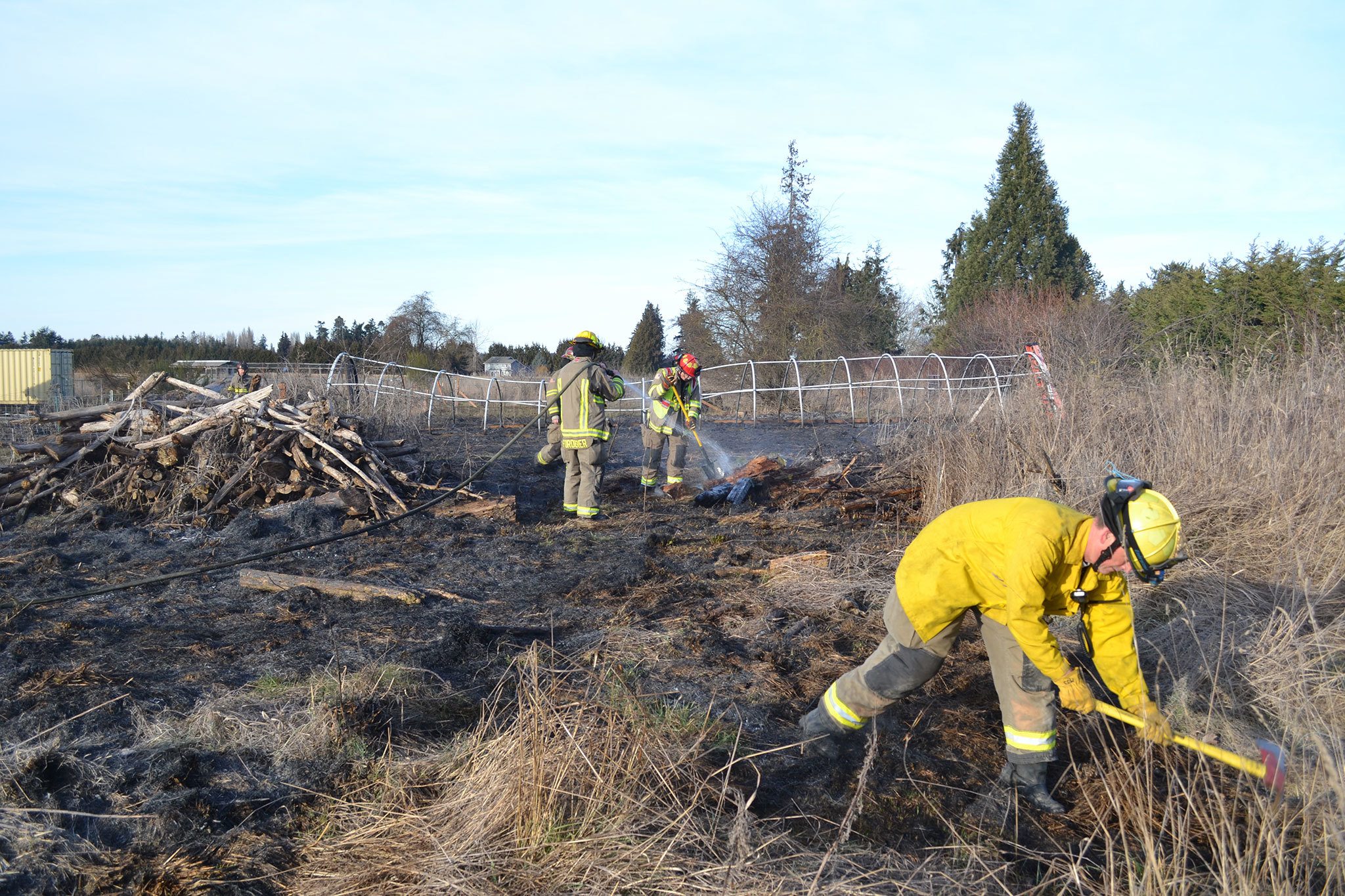 Clallam County Fire District 3 responded to a brush fire on Thursday, Feb. 2, in Carlsborg. Fire officials report the call came in at 3:13 p.m. for the fire at 201 Childers Lane, west of Sequim. Fire Chief Ben Andrews said the resident was burning outside and the wind picked up and spread the fire about 200 yards from the home’s backyard into a nearby field but avoiding a large brush pile. No animals or residents were harmed. Sequim Gazette photo by Matthew Nash
