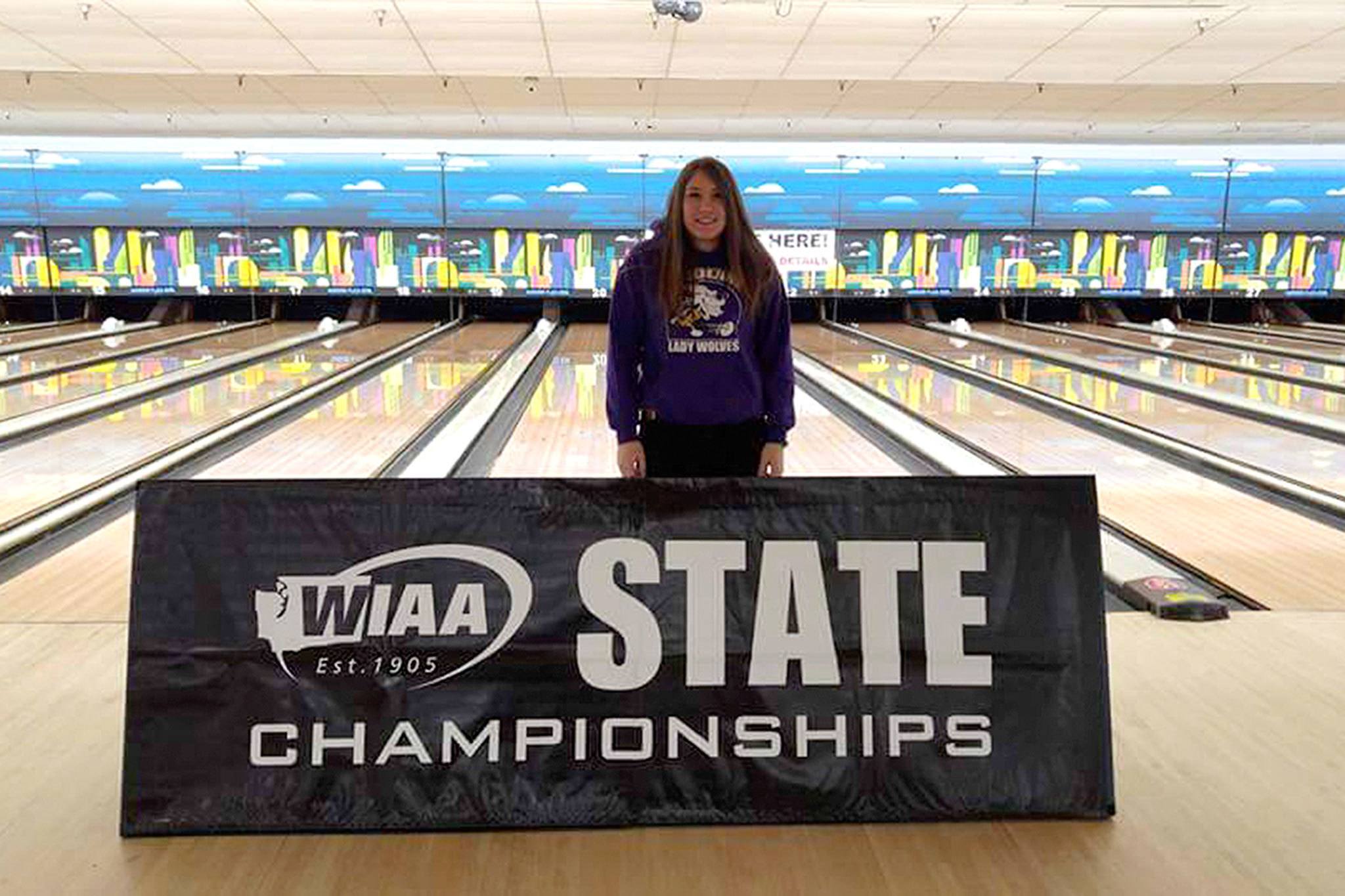 Destiny Staus stands in Narrows Plaza Bowl before the 1A/2A state bowling tournament last weekend. She’s the first Sequim bowler to compete at state since 2011. Photo courtesy of Randy Perry