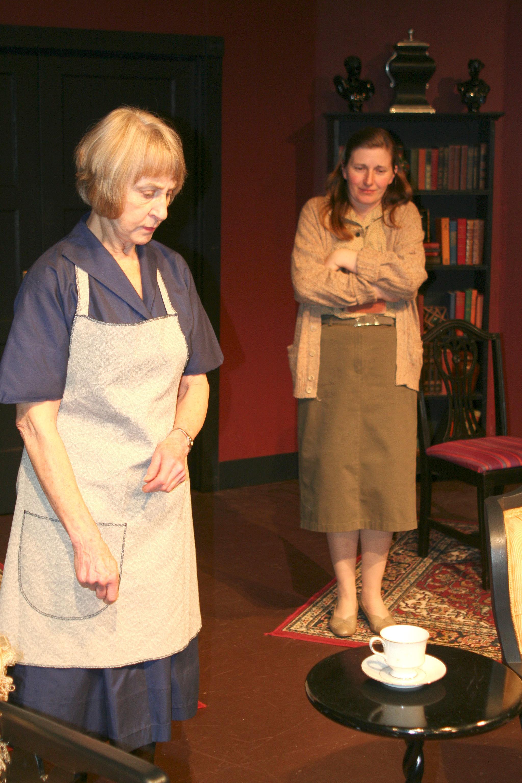 The surroundings come to life for Mrs. Dudley, played by Cherie Trebon, left, and Eleanor Vance, by Sharah Truett, in “The Haunting of Hill House” running Feb. 24-March 11, in the Port Angeles Community Playhouse. Photo by Kate Carter