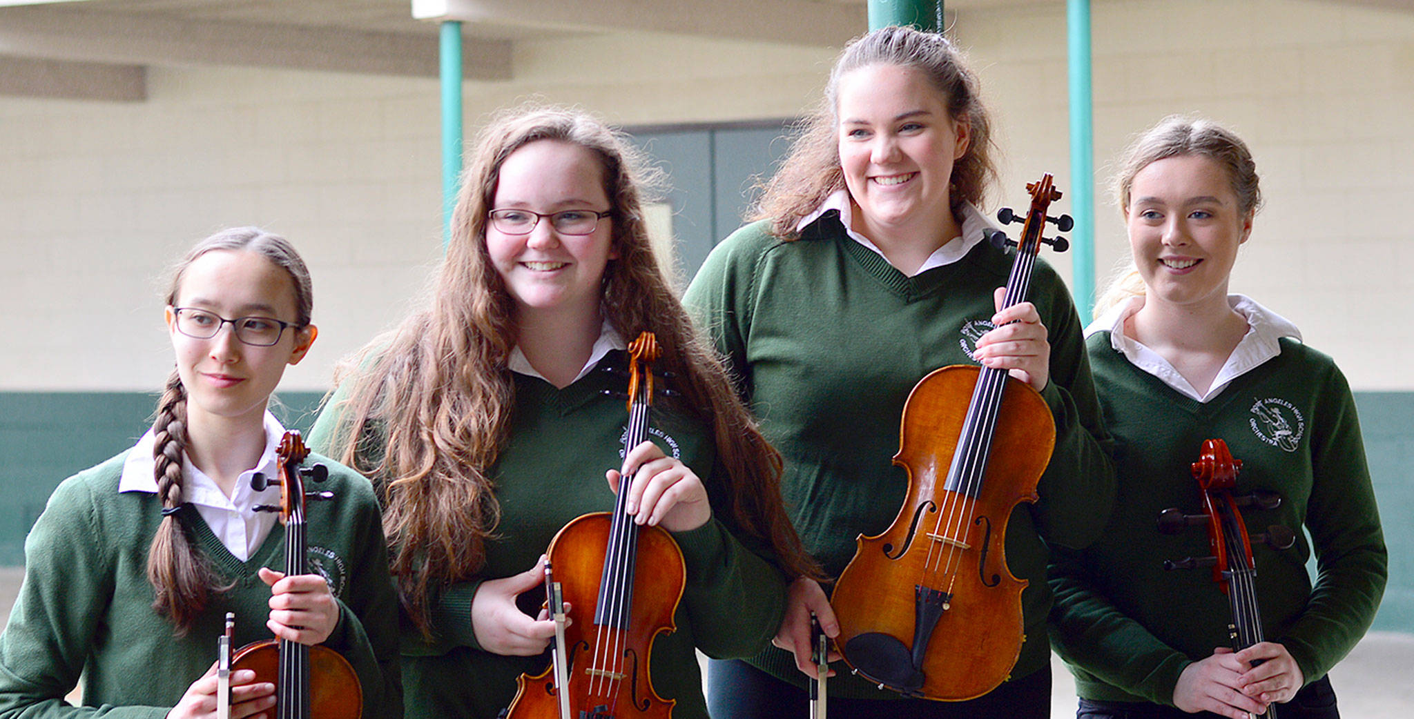 Port Angeles High School chamber musicians to play at the March 25 Applause! Auction and Dinner are, from left, Hana Kildall, 18; Marley Cochran and Lauren Waldron, both 17; and Lauren Paup-Byrnes, 16. Submitted photo