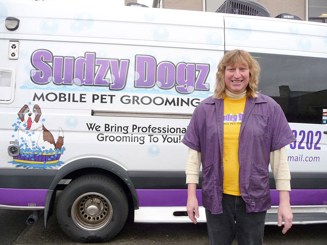 Sudzy Dogz owner Wilhelm Beckmann is ready to roll into your neighborhood with his full-service dog grooming van. Sequim Gazette photos by Patricia Morrison Coate