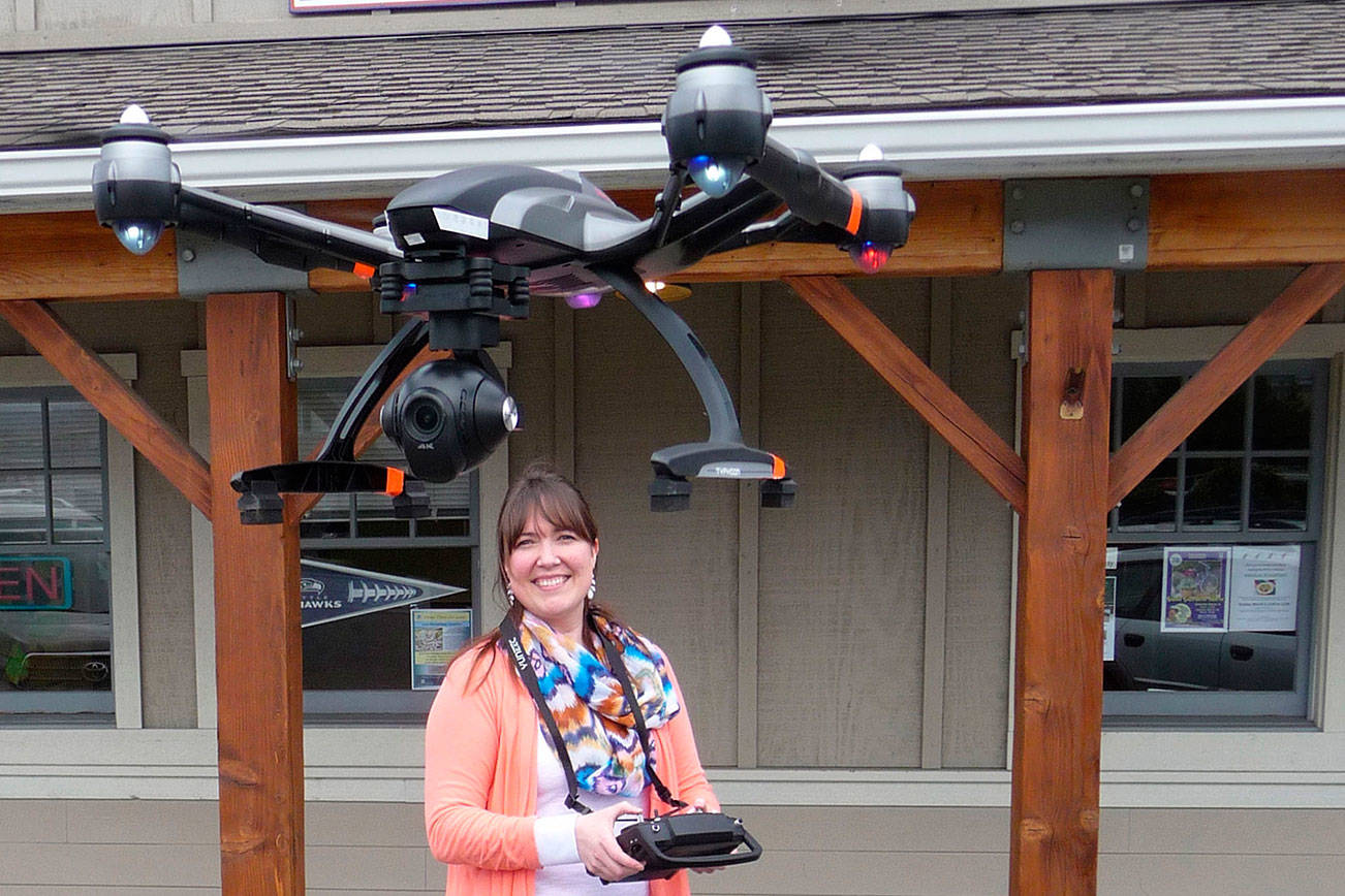 Business: Windermere flies high; drone pilot on staff videos aerial views to showcase listings