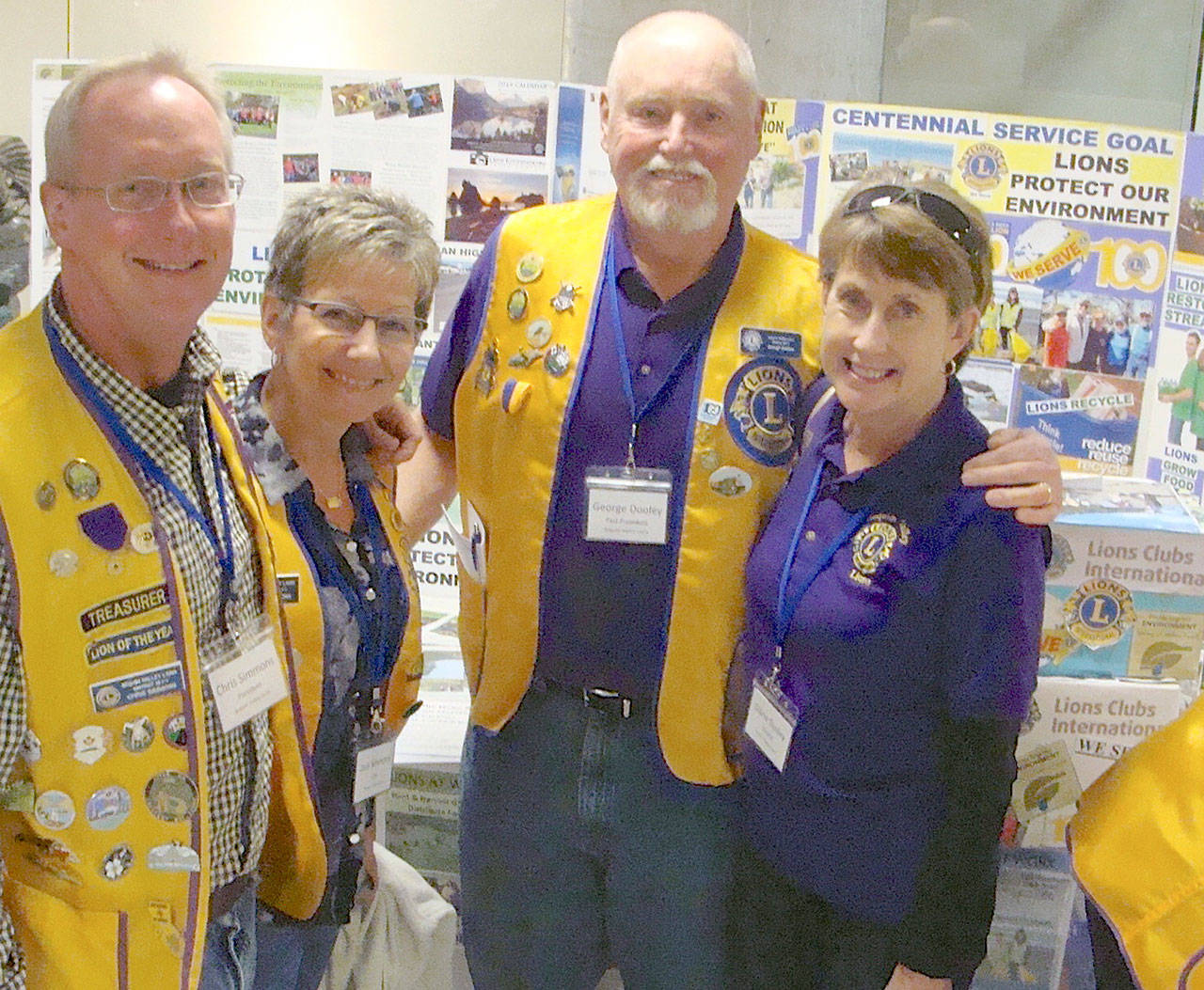 Pictured at the conference are Sequim Valley Lions president Chris Simmons and his wife Jodi, with Past Zone Chair George Dooley and his wife, Dianne, who is Lions Eyeglass Recycling Center Chair. Submitted photo