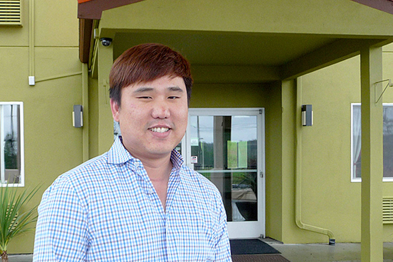 Andy Cho, an Auburn entrepreneur, purchased the former Days Inn & Suites in April and now it’s the Red Lion Inn & Suites. Cho plans to renovate the property this fall/winter and says he’s excited to be in Sequim. Sequim Gazette photo by Patricia Morrison Coate
