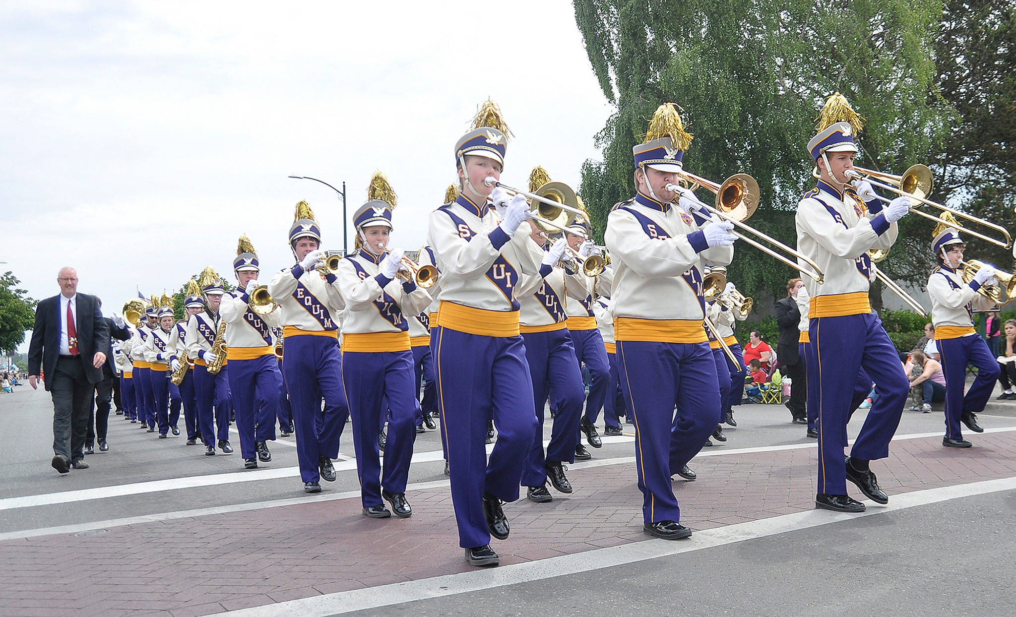 Sequim’s annual Irrigation Festival Grand Parade sees about 100 entries each year including the Sequim High School Marching Band, seen here in 2016’s parade. Sequim Gazette file photo by Michael Dashiell