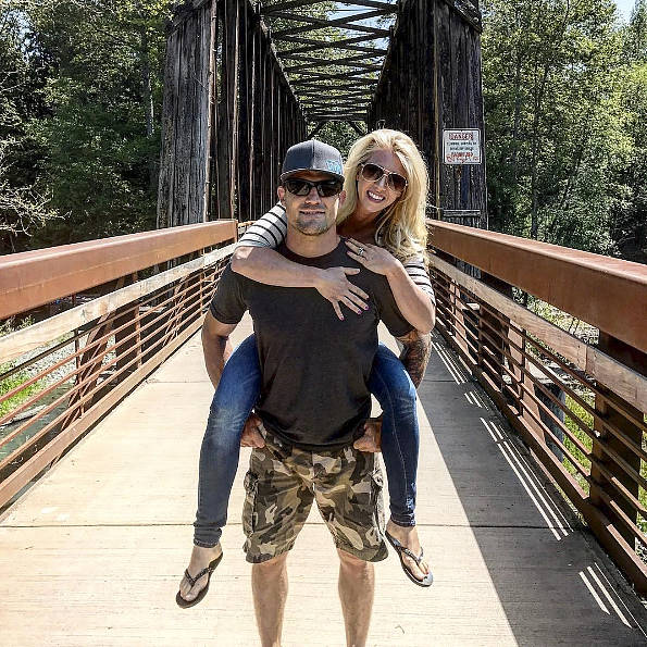 Bristol and Aubrey Marunde, stars of “Flip or Flop Vegas,” stand on the Dungeness Railroad Bridge last week a few days after learning their TV show was renewed for a second season on HGTV. The show focuses on purchasing, renovating and selling homes in Las Vegas. Photo courtesy of Bristol Marunde