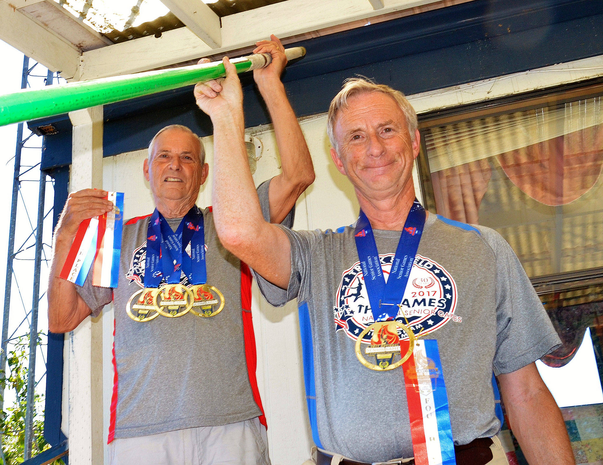 Chuck (left) and Phil Milliman racked up gold medals in the pole vault at the Birmingham 2017 National Senior Games in Alabama earlier this month. Photos courtesy of the Milliman family