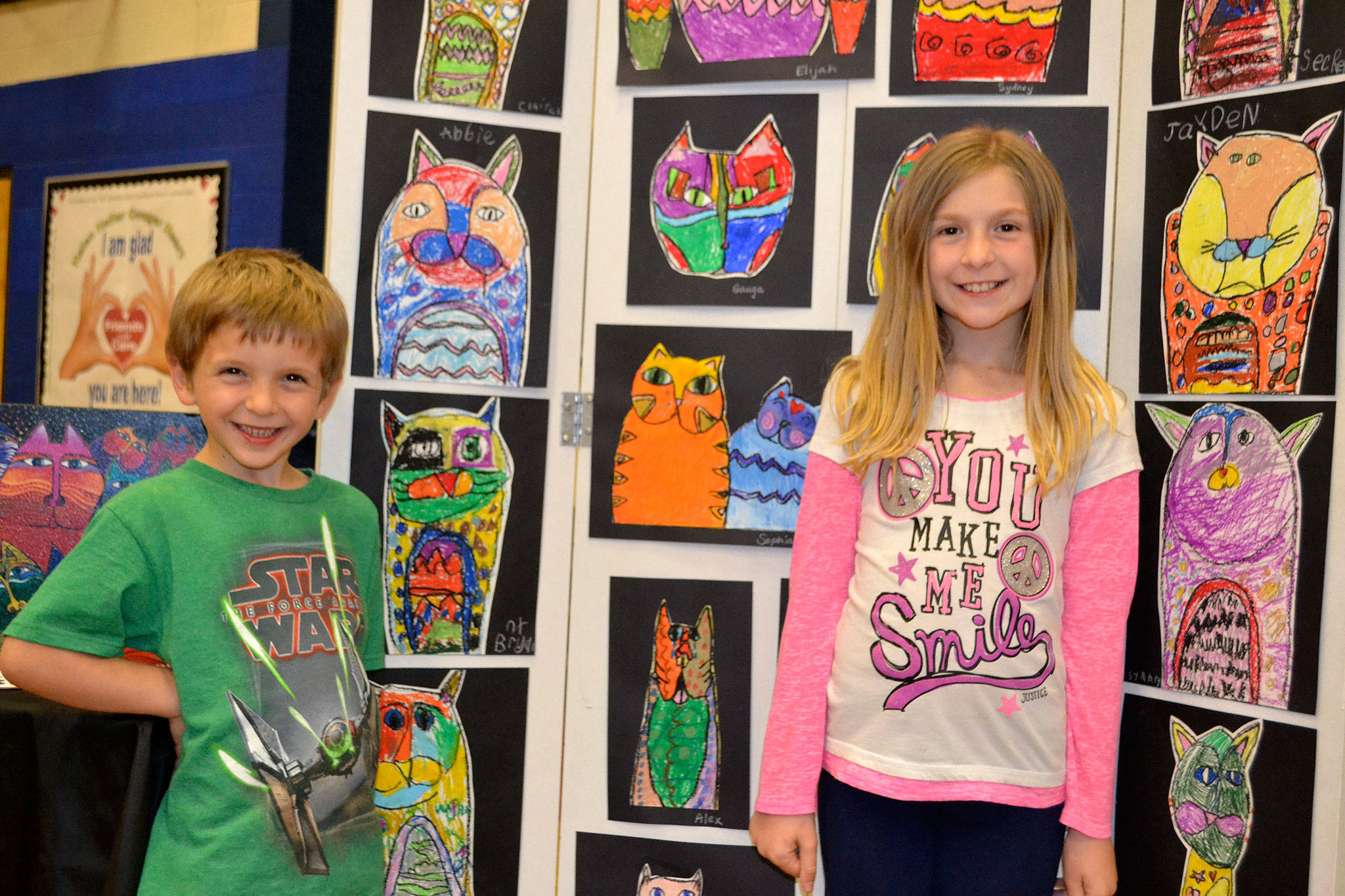Bryant, 6, and Sophia Lawson, 9, of Stephanie Grotzke-Nash and Rachel Oden’s art classes, both enjoyed their pieces following Laurel Burch’s style. “I put the most into this one,” Sophia said. I thought it’d be fun and I love cats.” “I love cats too,” Bryant said.