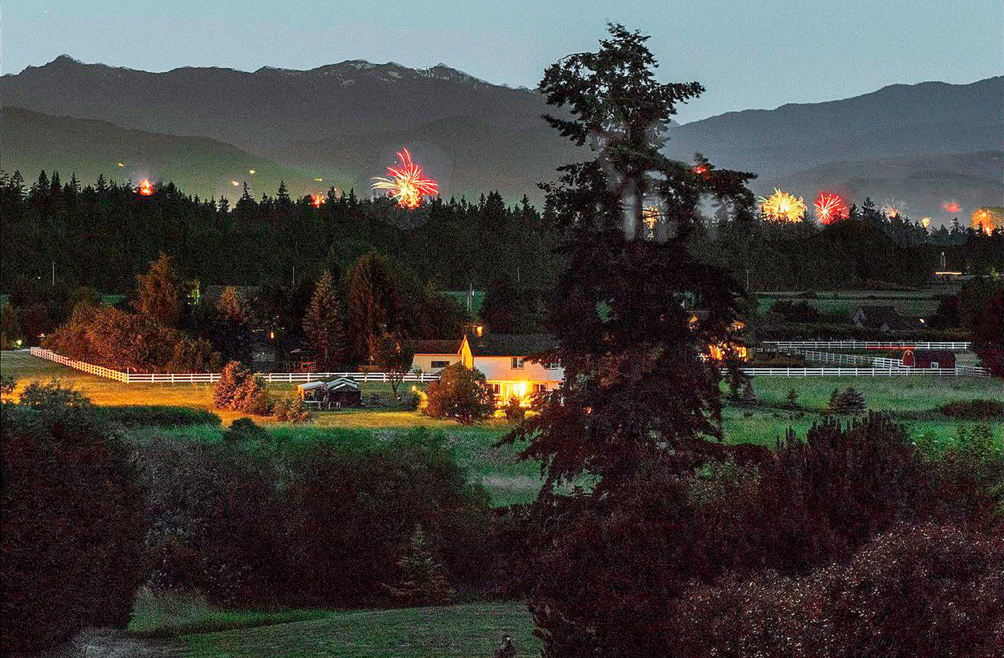 Contributor Bob Lampert snaps a time delay shot of fireworks going off around the Sequim area on the Fourth of July.