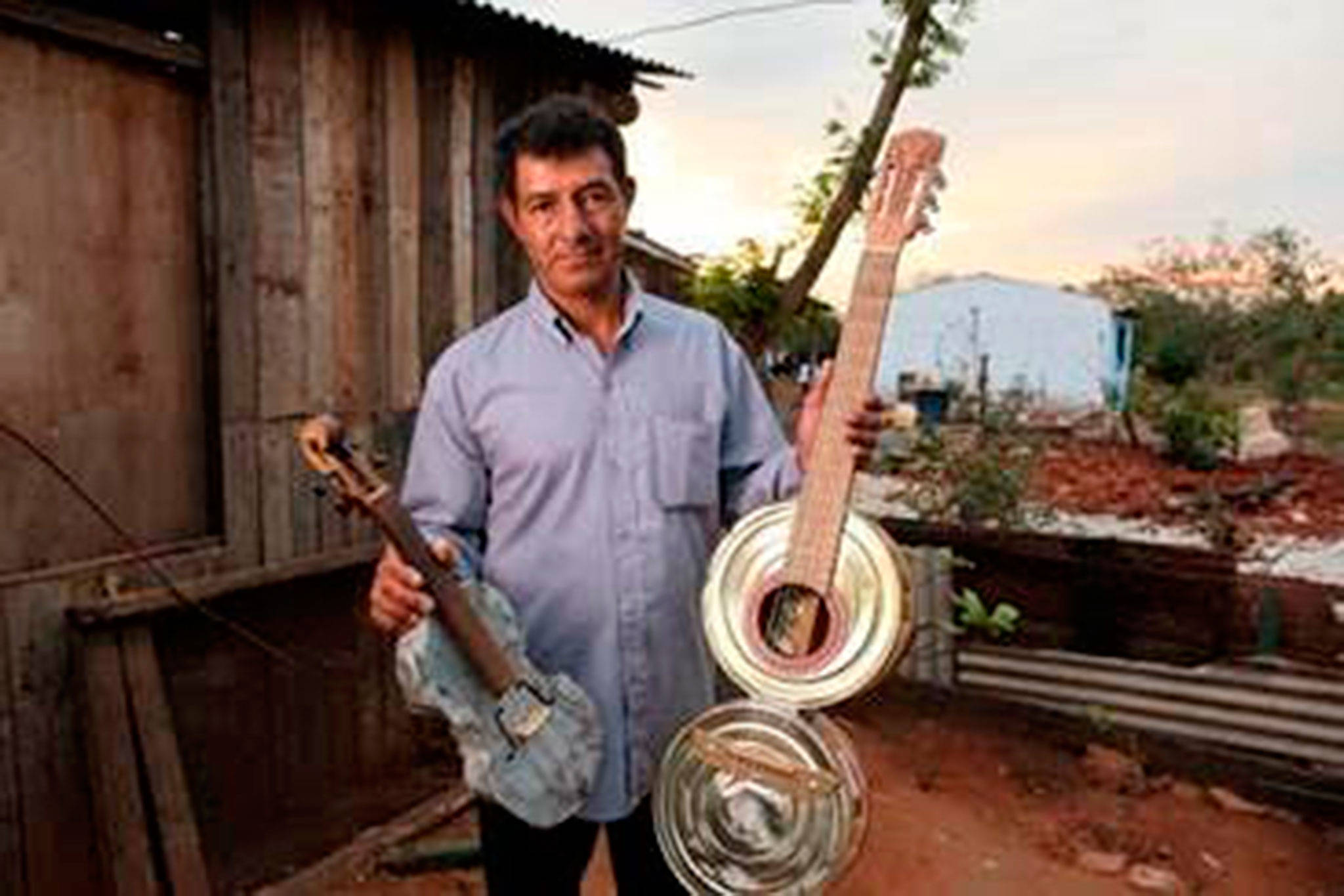 Nicolas “Cola” Gomez from the Recycled Orchestra of Cateura showcases hand-made instruments featured in the documentary “Landfill Harmonic” which will be shown at the Sequim Library at 6 p.m. Tuesday, July 25. Submitted photo