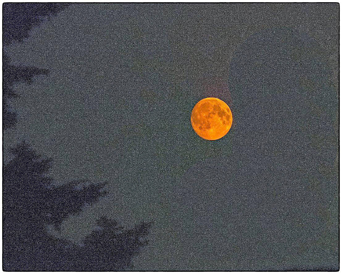 Contributor Bob Lampert caught his image of Saturday’s (Aug. 5) full moon, through the haze of Canada’s wildfires.