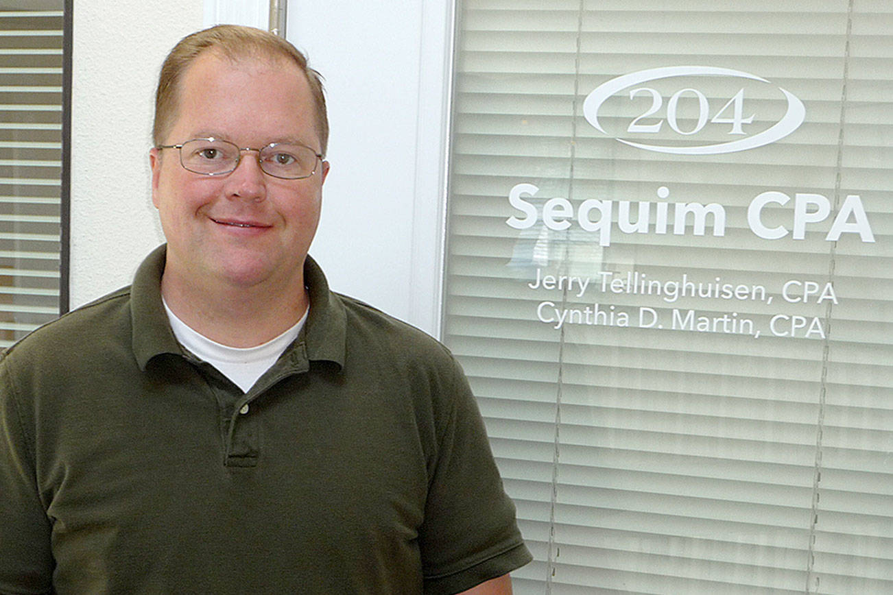 Jerry Tellinghuisen, a certified public accountant, welcomes new clients to Sequim CPA. He and his partner Cynthia D. Martin opened the business in June. Sequim Gazette photo by Patricia Morrison Coate