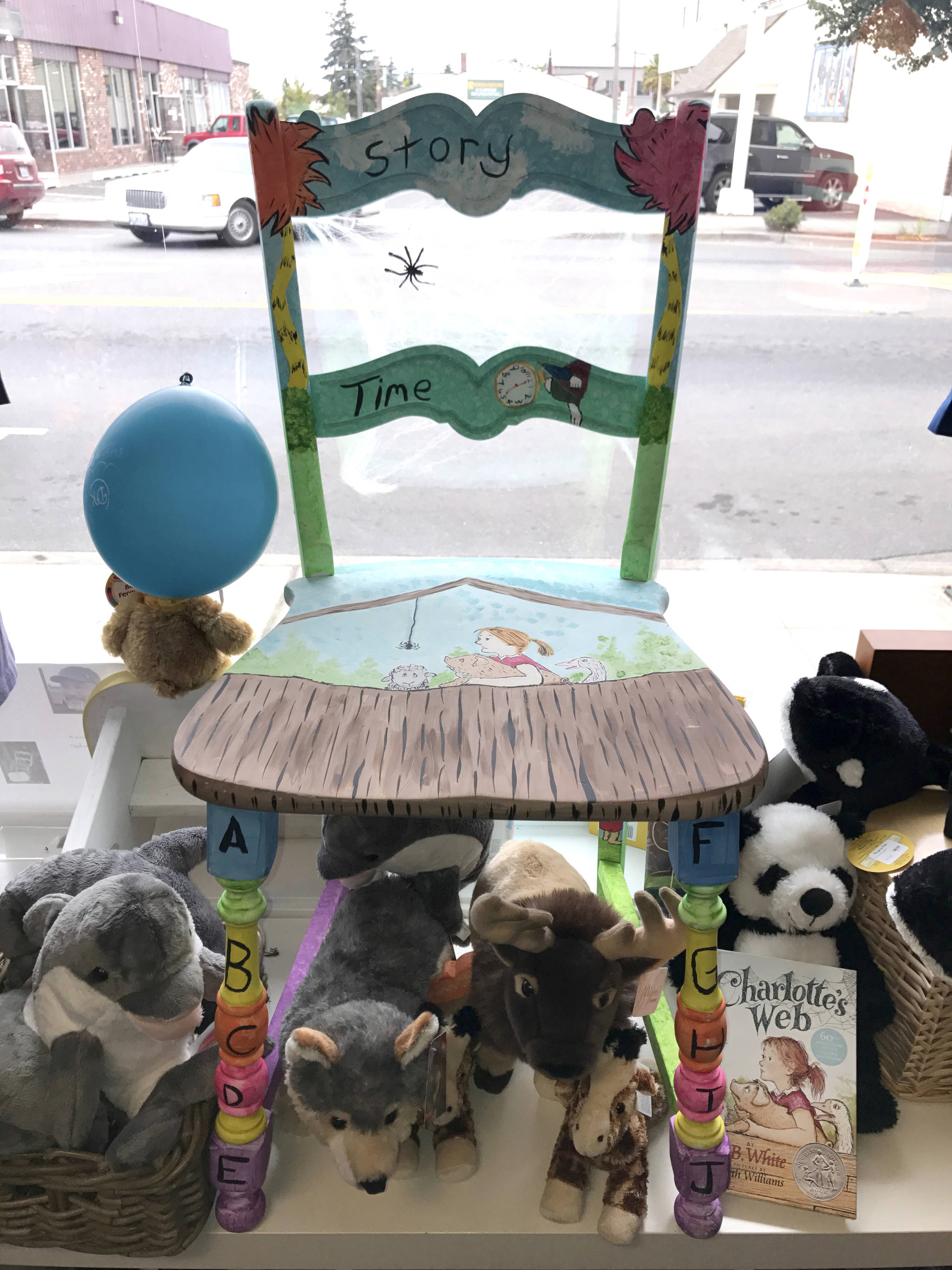Kevin James’ “Charlotte’s Web” artistic chair sits in the window of Dungeness Kids Co. located at 163 W. Washington St. in Sequim.                                 Sequim Gazette photos by Erin Hawkins