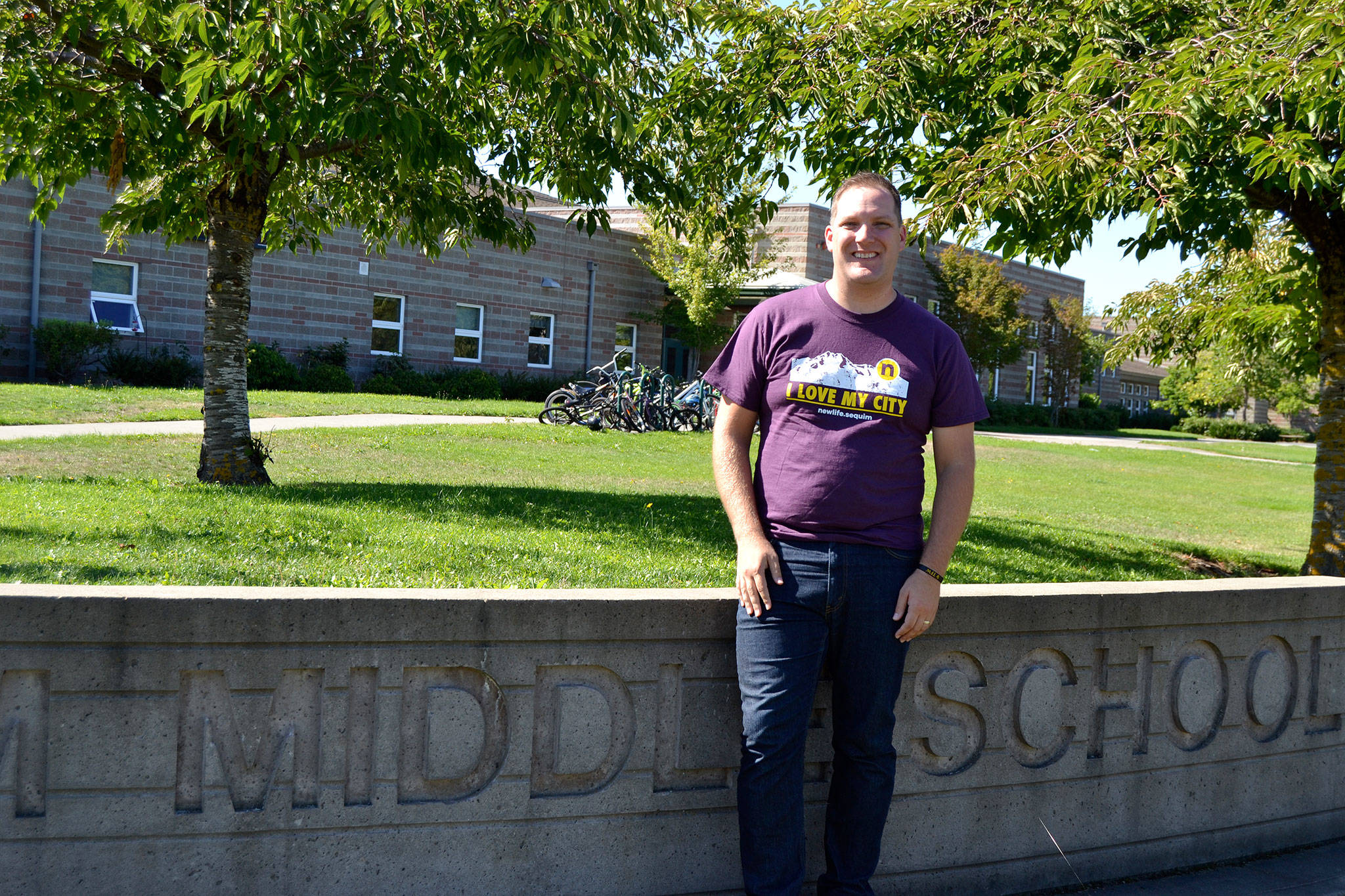 David Lyke, campus lead for Sequim newlife church, stands outside Sequim Middle School where the church holds its grand opening at 10:30 a.m. Sunday, Sept. 17. Lyke said his church is looking to love and serve Sequim. Sequim Gazette photo by Matthew Nash