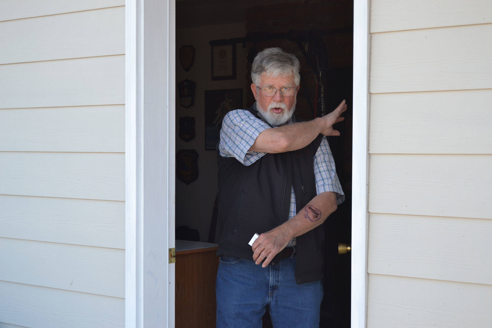 Terry Moore, 74, describes how three pit bulls attacked him outside his home on Sept. 23. Two dogs have been euthanized so far and a third one is scheduled to be put down soon as well after being declared “dangerous” by city officials. Sequim Gazette photo by Matthew Nash