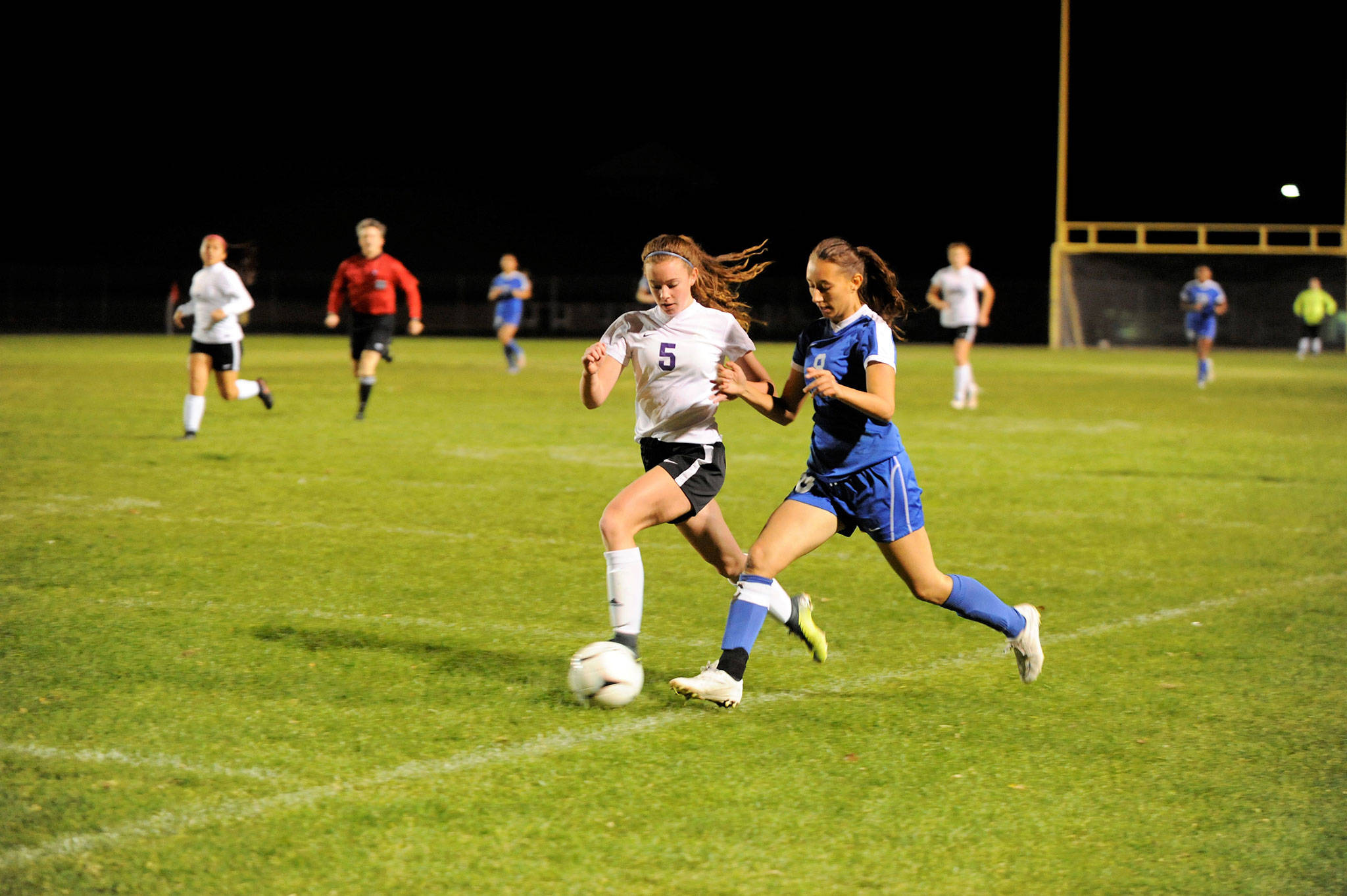 Sequim’s Mary McAleer looks to take the ball away from Bremerton’s Abigail Dubeau on Oct. 23. The Wolves went on to win 1-0 and finish their regular season tonight, Oct. 25, in Kingston. Sequim Gazette photo by Matthew Nash