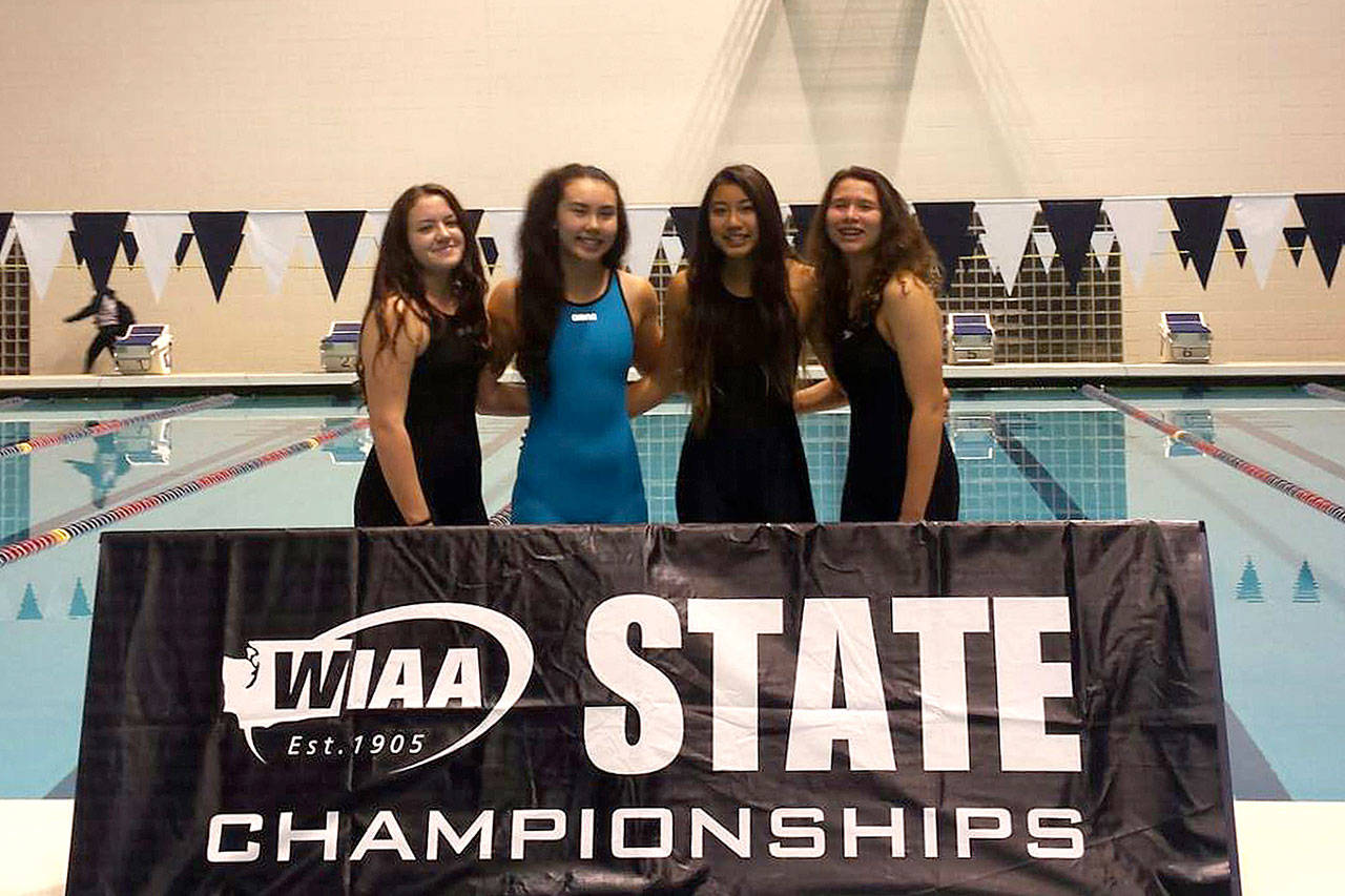 Sequim swimmers, from left, Sydney Swanson, Sydnee Linnane, Jasmine Itti, and Sonja Govertsen helped the Wolves finish 18th and earn two top-eight finishes at the 2A state swimming and dive meet on Nov. 10-11. Submitted photo