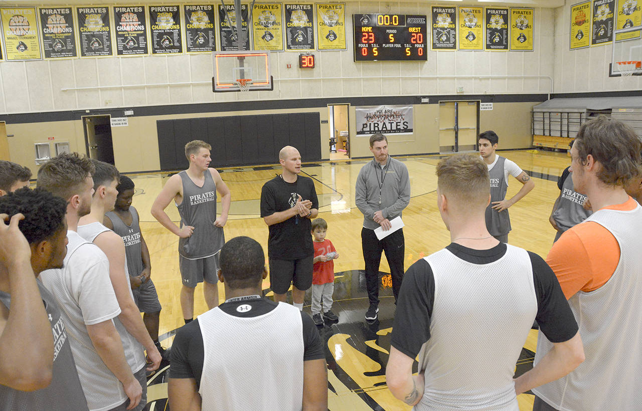 Peninsula College Athletics Peninsula men’s basketball coach Mitch Freeman speaks to his players after a recent practice. Freeman is in his fifth year as head coach of the Pirates.
