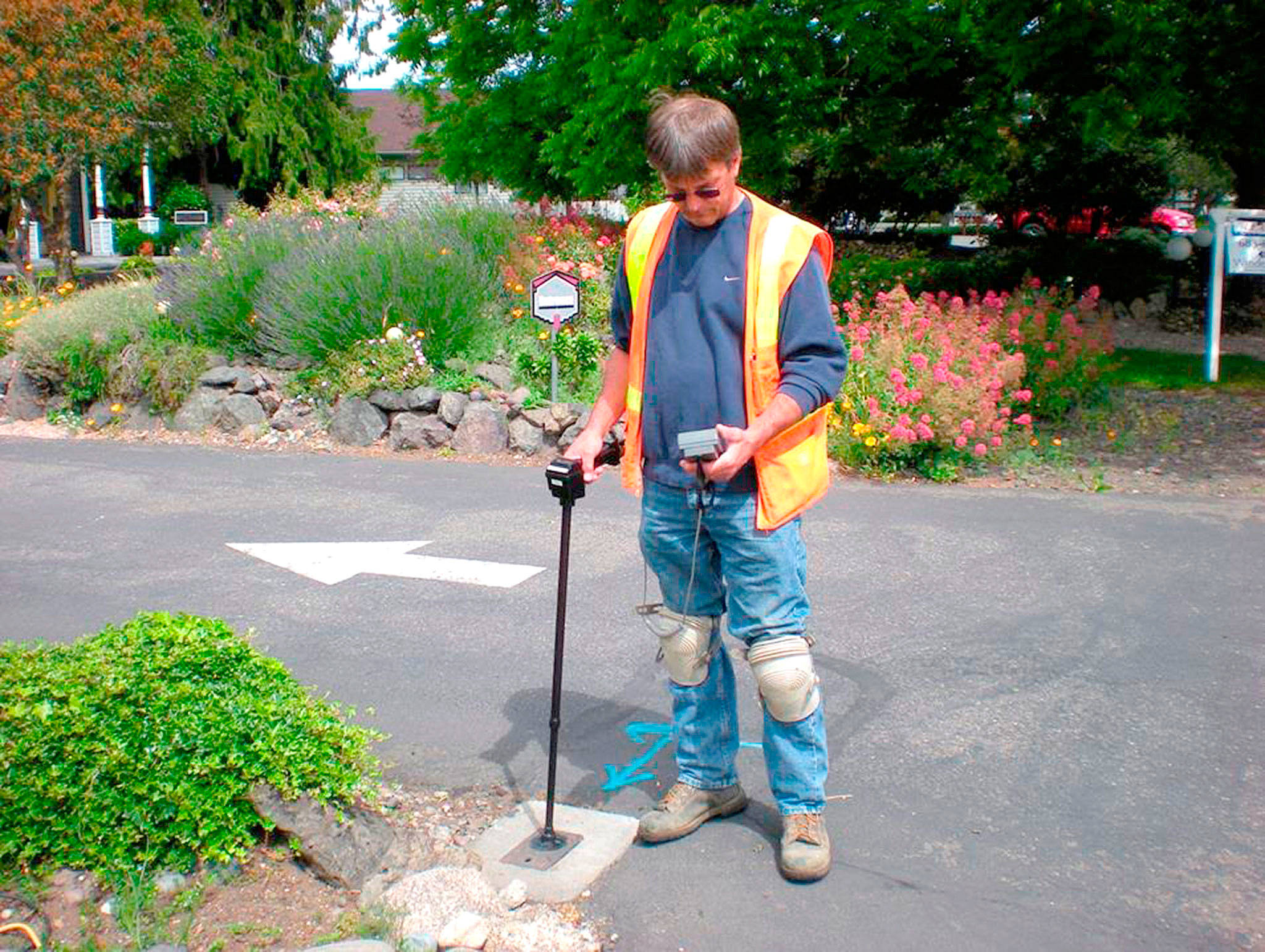 Kevin Hergert with the City of Sequim’s Public Works Department checks a meter at a local business. In 2018, qualifications for utility discounts are changing for low income households that qualify. Photo Barbara Hanna/City of Sequim